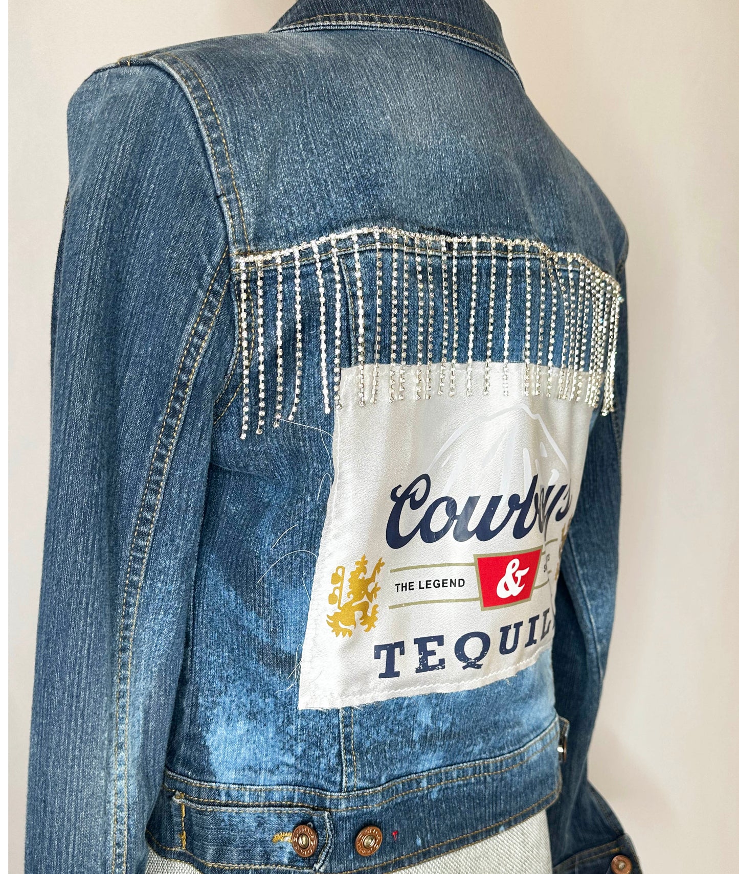 "Cowboys & Tequila" Womens Denim Jacket Detailing - featuring rhinestone fringe look with satin patch.