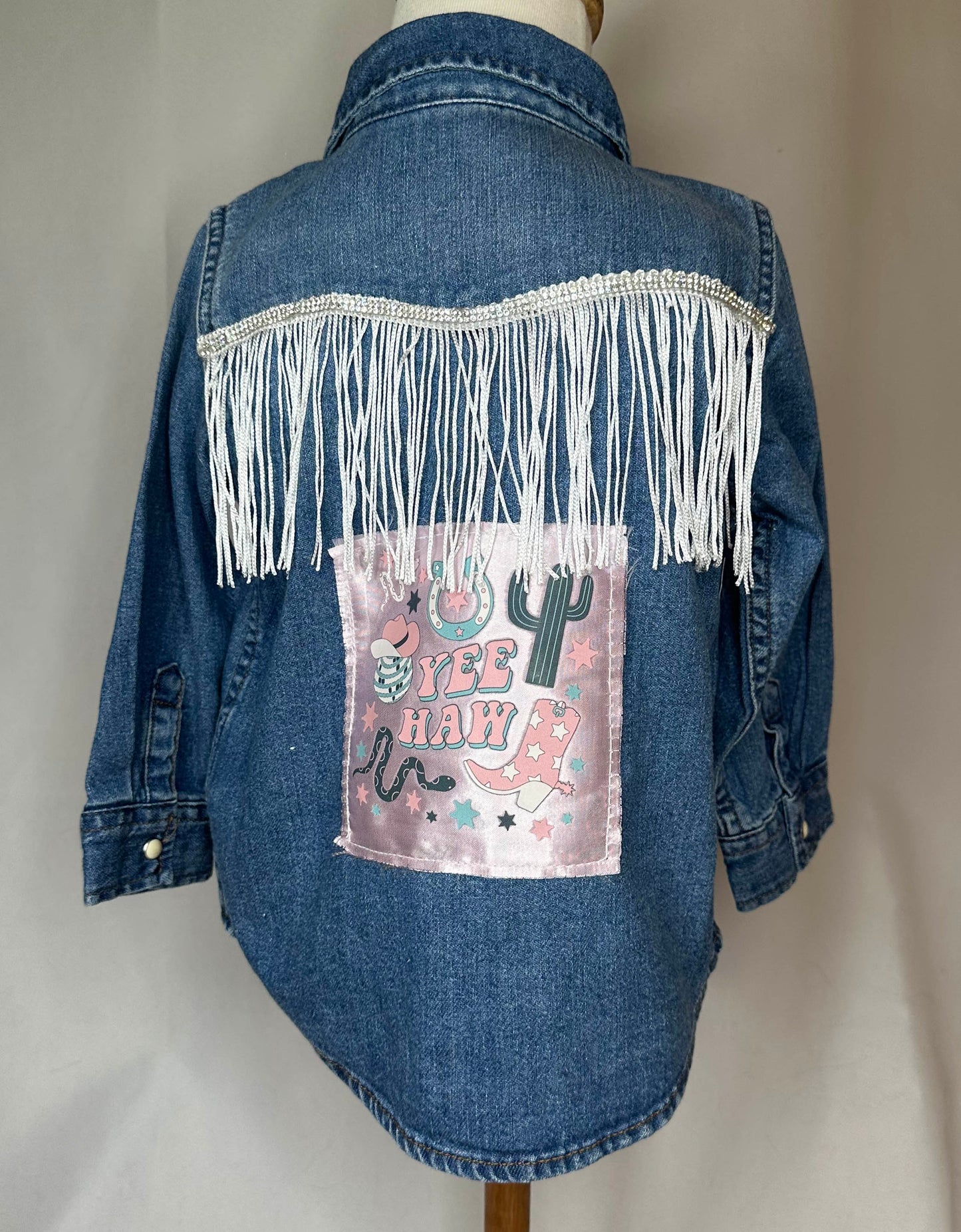 Toddler 18-24 Months "Yee Haw" silver fringe and satin patch denim t-shirt back side.