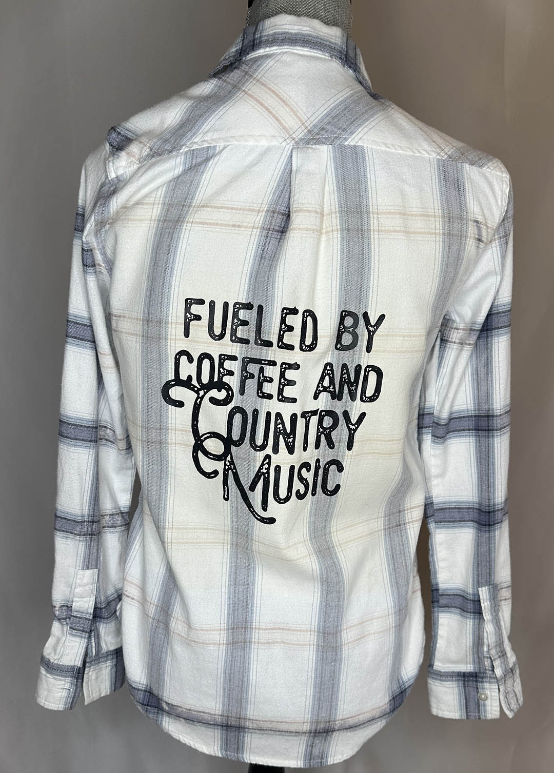 "Fueled by Coffee & Country Music" Women's button up Flannel in white back side