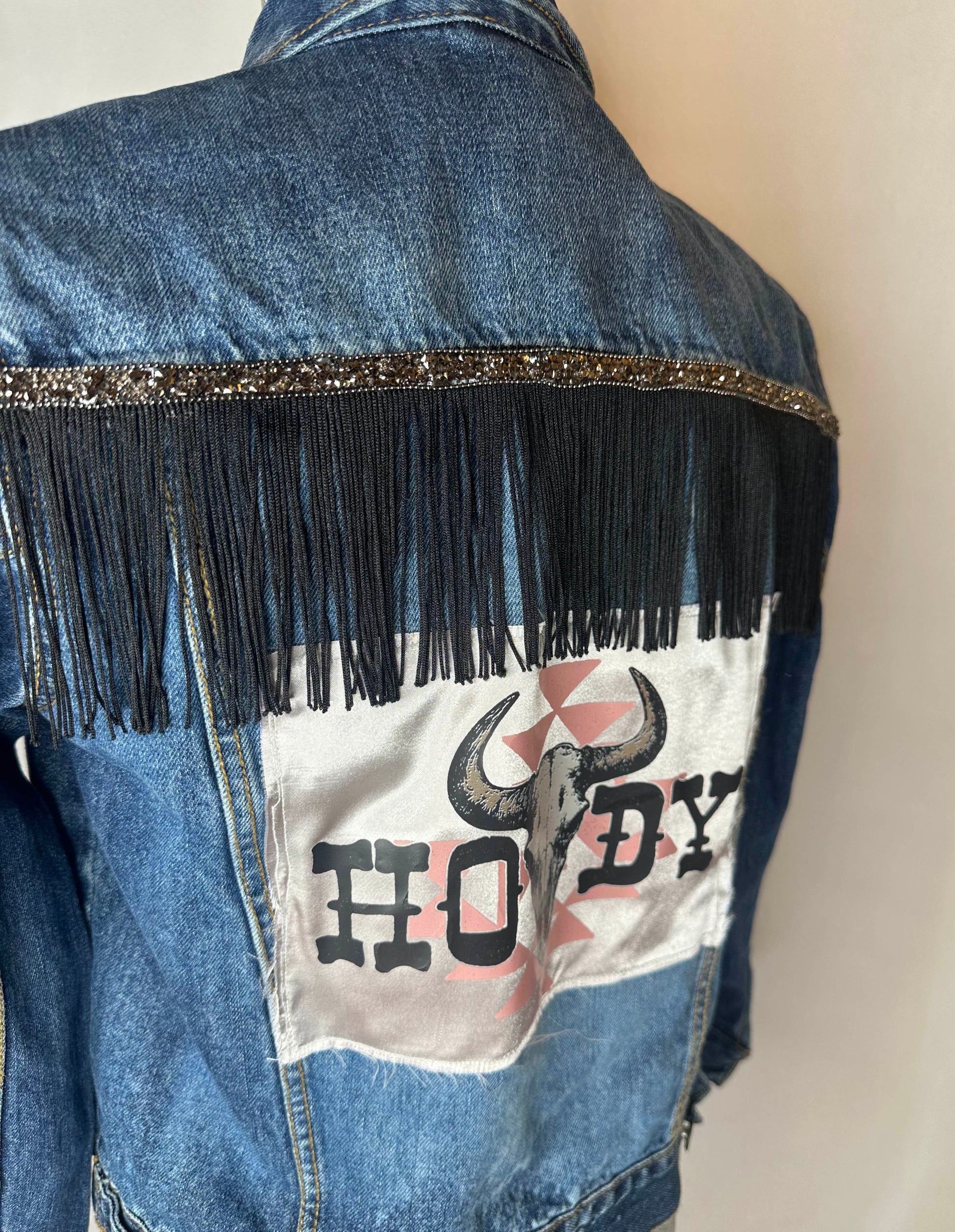 "Howdy" Women's Fringe Denim Jacket Detailing.
